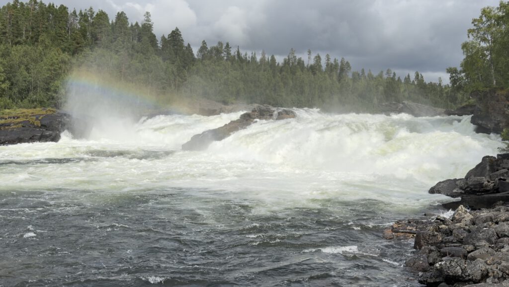 Waterfall near Bardu with a rainbow in the spray