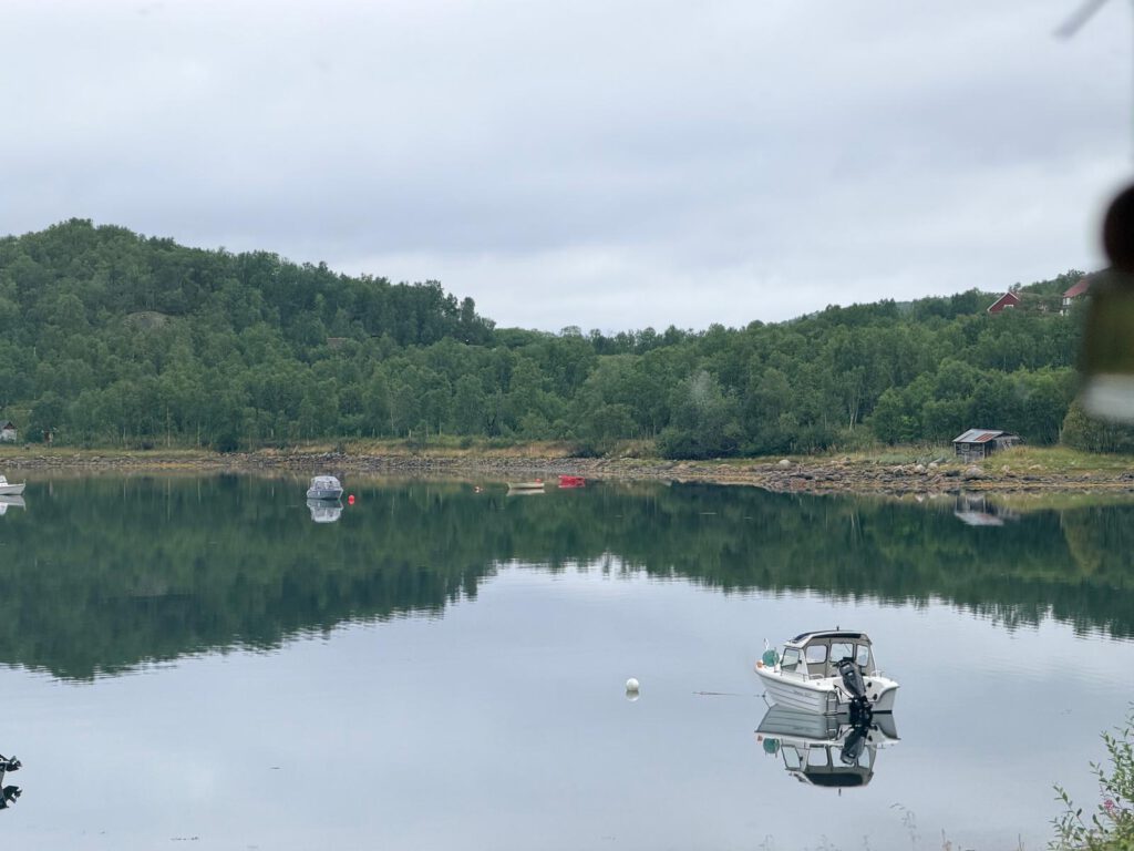 Boat on the calm fjord