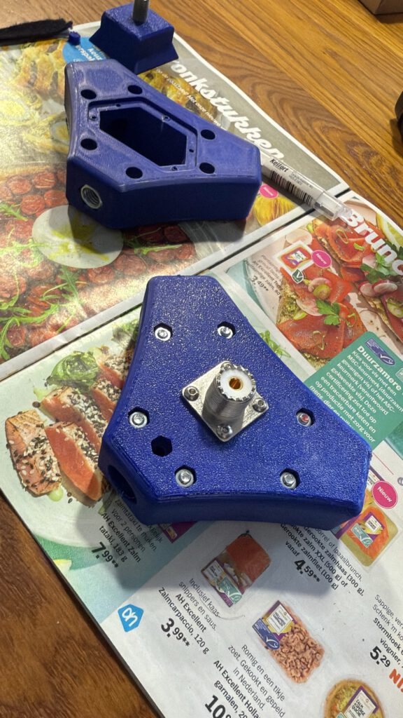 Blue 3D printed antenna base parts